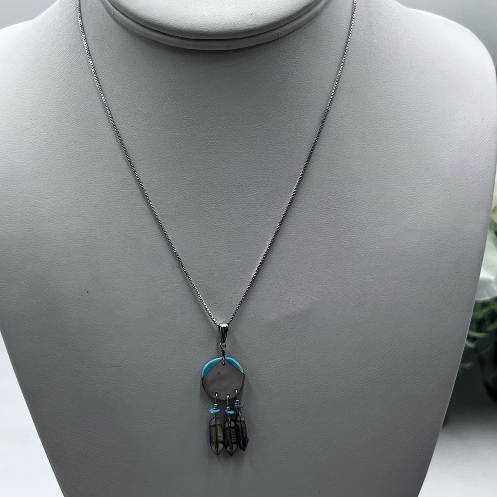 Helen Harrison Navajo Shell Turquoise Shield Feather Pendant
Necklace "HH" 925
